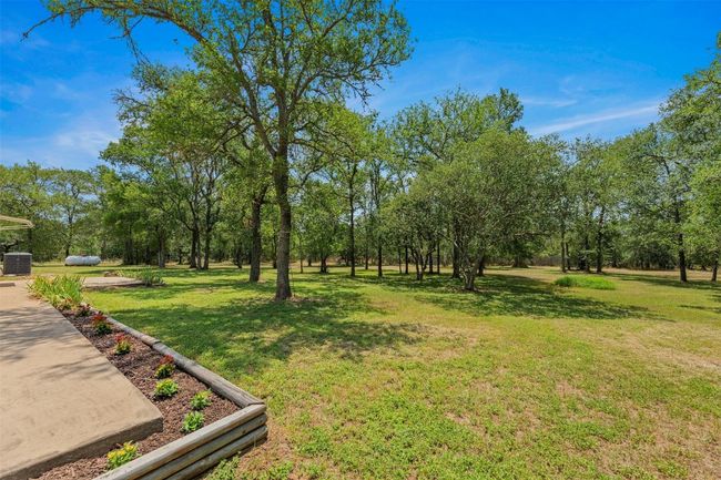 Enjoy privacy from your back porch views. | Image 22