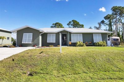 7168 Lighthouse Street, House other with 3 bedrooms, 3 bathrooms and null parking in Englewood FL | Image 2