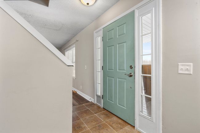 Enter through the front door off covered porch | Image 6