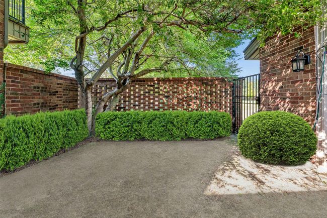 Back patio space with locked gate opening directly to community greenbelt and just steps from the pool! | Image 27