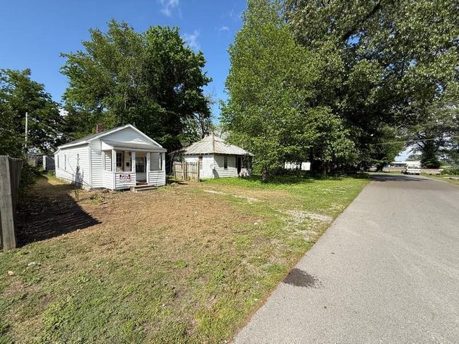 View of yard with a porch | Image 19