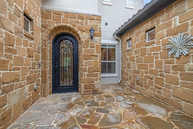 Entrance to property with brick siding | Image 4