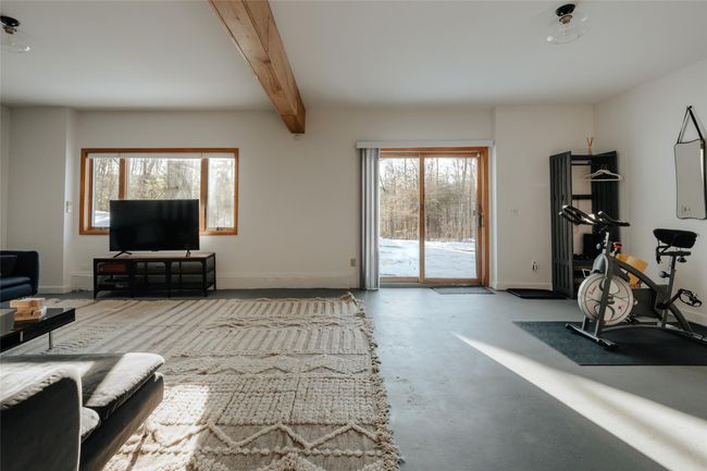 Basement with beamed ceiling | Image 22