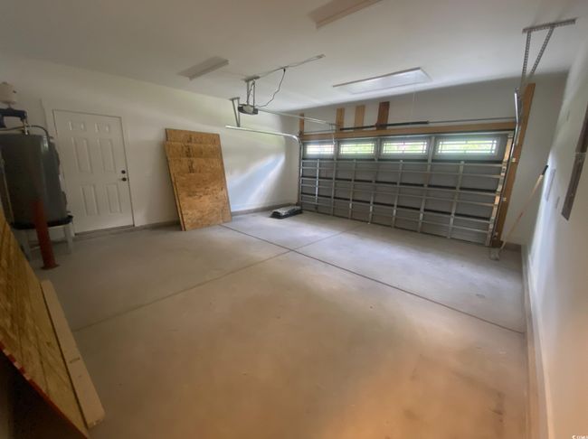 Laundry area featuring electric dryer hookup, cabinet space, and hookup for a washing​​‌​​​​‌​​‌‌​‌‌​​​‌‌​​‌‌​‌​​​​​‌ machine | Image 32