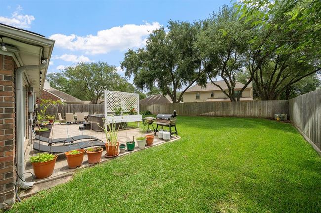 Large patio with a relaxing hot tub, perfect for entertaining or stargazing | Image 4