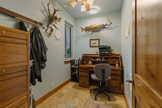 Office featuring a ceiling fan and baseboards | Image 24