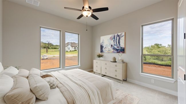 Bedroom featuring carpet floors and a ceiling fan | Image 10
