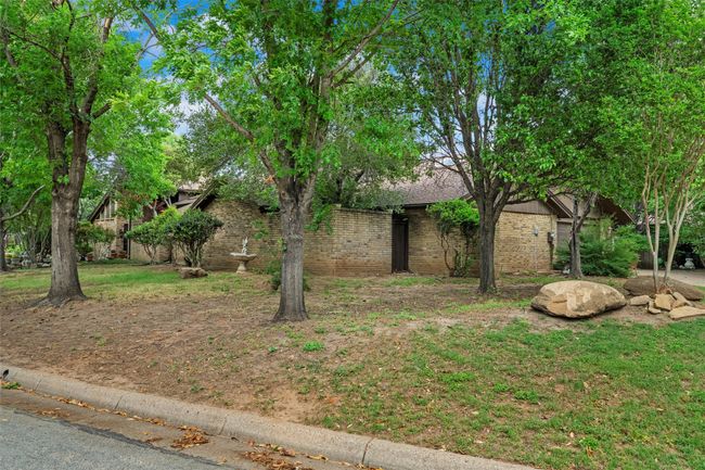 Obstructed view of property featuring brick siding | Image 27