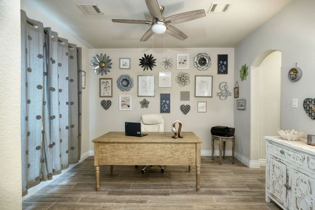 This room sits at the front of the home and can be used as an office or a formal dining room. | Image 10