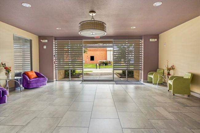 Common area with recessed lighting and a textured ceiling | Image 11