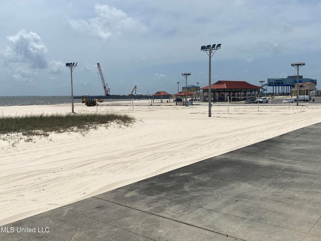 beach with partial view of harbor and so | Image 9