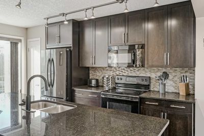 610 Cranford Crt Se, Townhouse with 2 bedrooms, 2 bathrooms and 2 parking in Calgary AB | Image 2