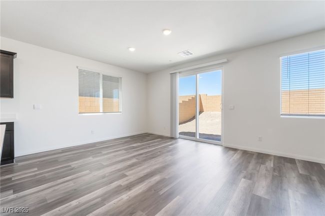 Unfurnished room featuring wood finished floors and recessed lighting | Image 10