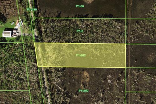 33392 Oil Well Rd, PUNTA GORDA, FL, 33955-9735 | Card Image