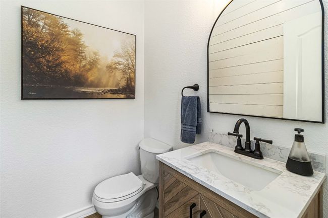 Half bath with toilet and vanity | Image 17