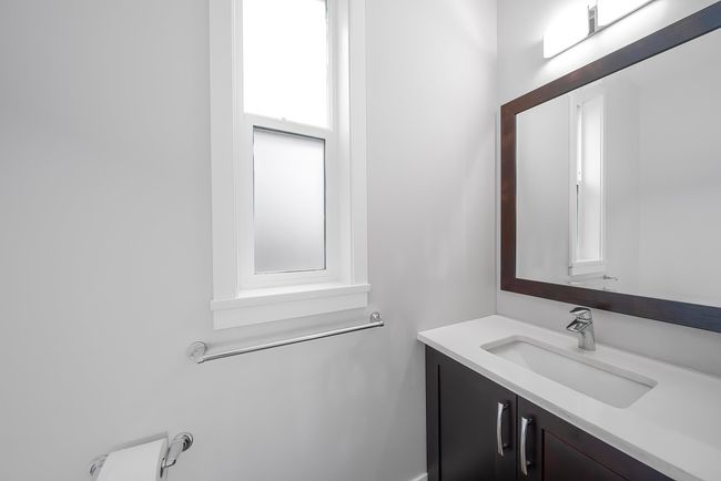Bathroom featuring vanity | Image 21