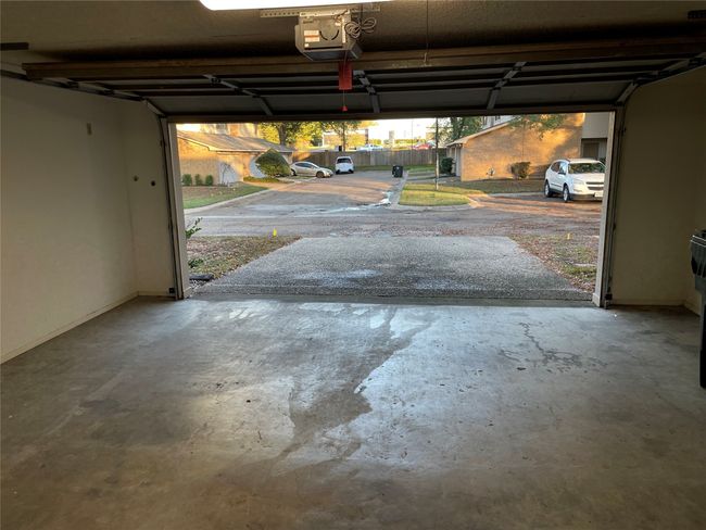 Garage with a garage door opener | Image 5