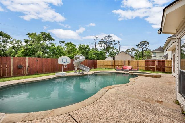 1003 Highland Woods Dr, House other with 4 bedrooms, 3 bathrooms and 2 parking in Highlands TX | Image 28
