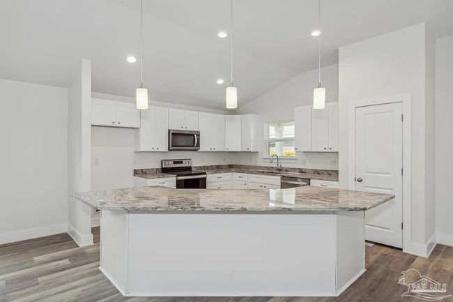 8512 Esplanade St, House other with 4 bedrooms, 2 bathrooms and 2 parking in Navarre FL | Image 4