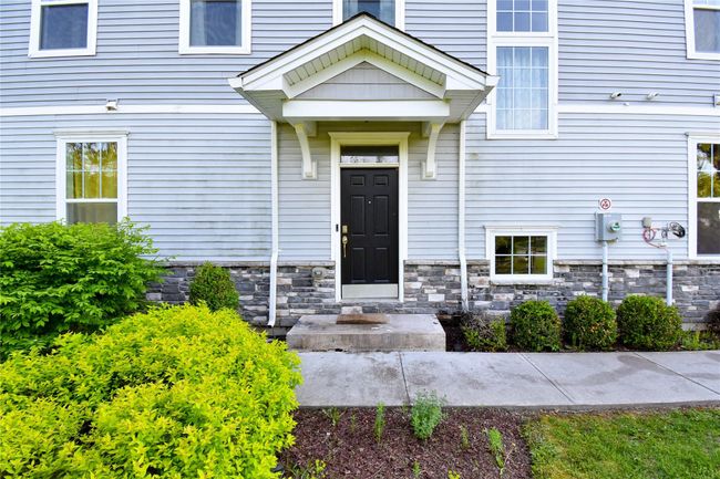Entrance to property featuring stone siding | Image 4