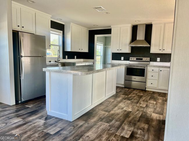 1404 1 St Ave, House other with 4 bedrooms, 2 bathrooms and null parking in Rochelle GA | Image 9