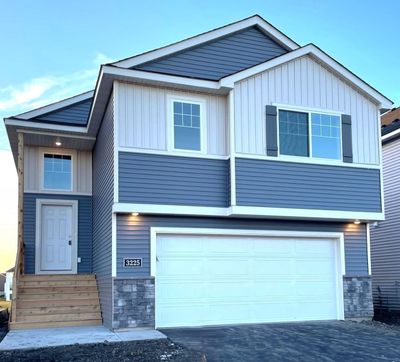 3225 Kady Ave NE- Home is finished at the final touch up stage. Will be ready for move-in on 12/3/24. Highlights include stone accents, unfinished walkout lower level, covered front entry, & located on a NO THRU STREET. | Image 1