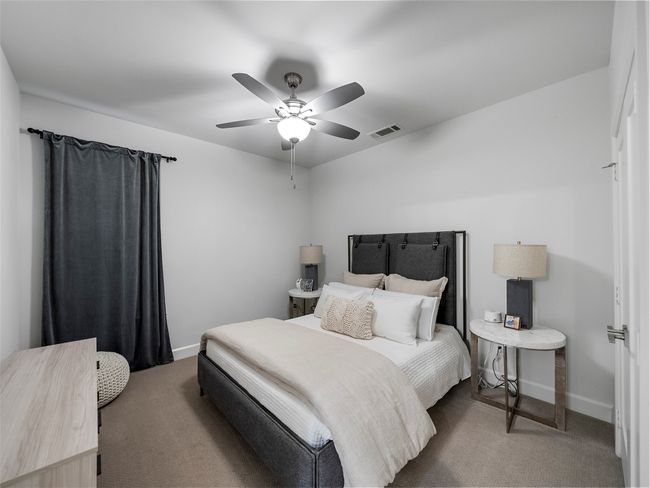 1st floor Bedroom with carpet flooring and a ceiling fan | Image 29
