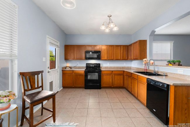 Plenty of cabinet space. | Image 8