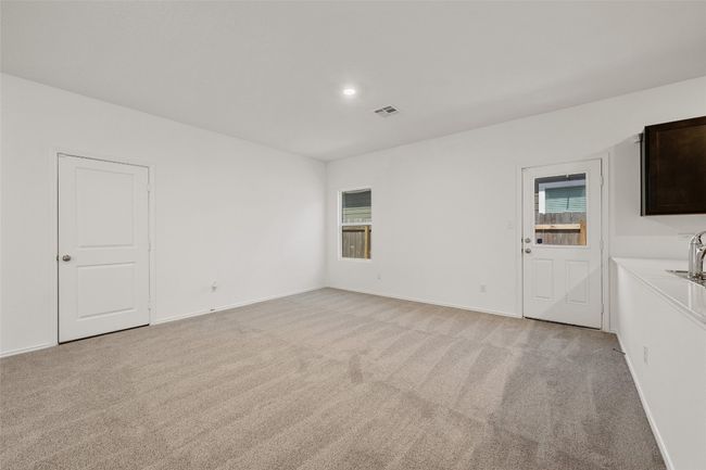 Spare room featuring light carpet and recessed lighting | Image 15