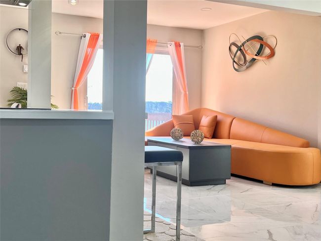 Living room featuring marble finish floor | Image 23