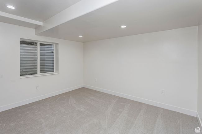 Carpeted spare room featuring recessed lighting and baseboards | Image 27