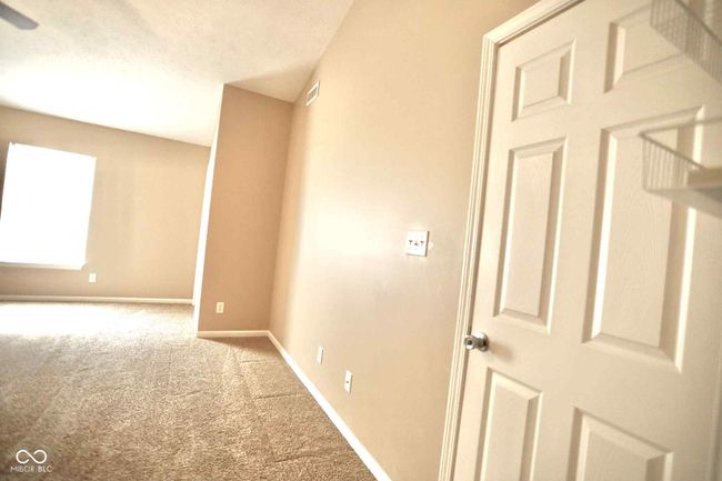 interior space with baseboards and visible vents | Image 30