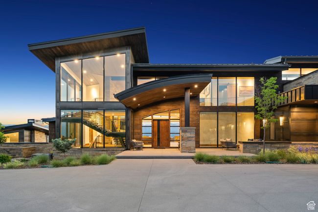 Back of property with stairs, a patio, and a balcony | Image 4