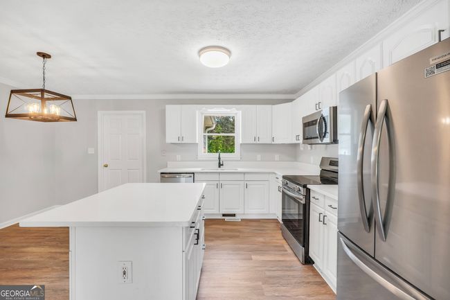 138 Sam Solomon Rd, House other with 3 bedrooms, 2 bathrooms and 2 parking in Locust Grove GA | Image 11