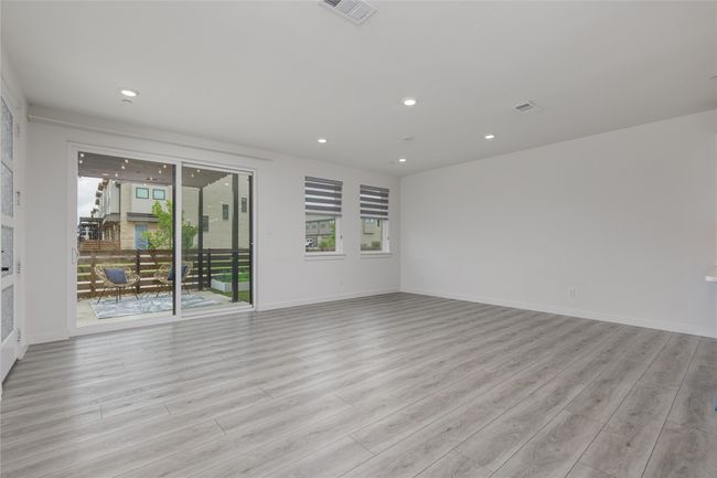 Unfurnished room with light wood finished floors and recessed lighting | Image 6
