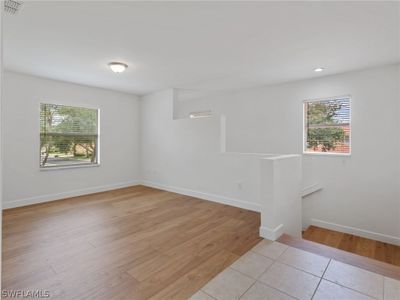 Unfurnished room with light hardwood / wood-style floors | Image 3