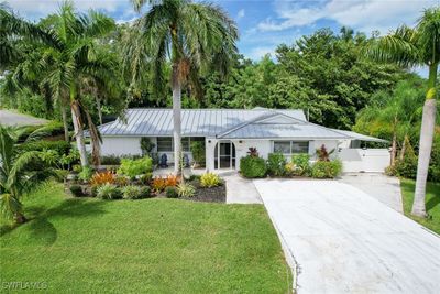 Single story home with a front yard | Image 1