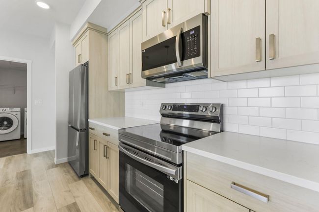 1201 - 220 Seton Grove Se, Condo with 2 bedrooms, 2 bathrooms and 1 parking in Calgary AB | Image 5