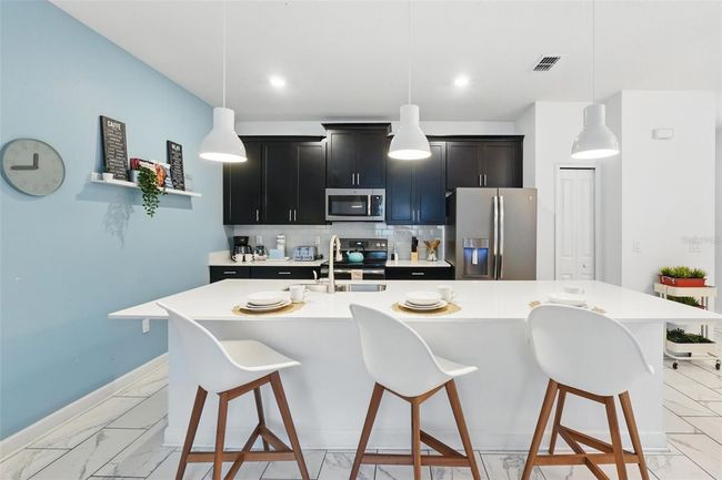 1570 Sandbagger Dr, Townhouse with 4 bedrooms, 3 bathrooms and null parking in DAVENPORT FL | Image 9