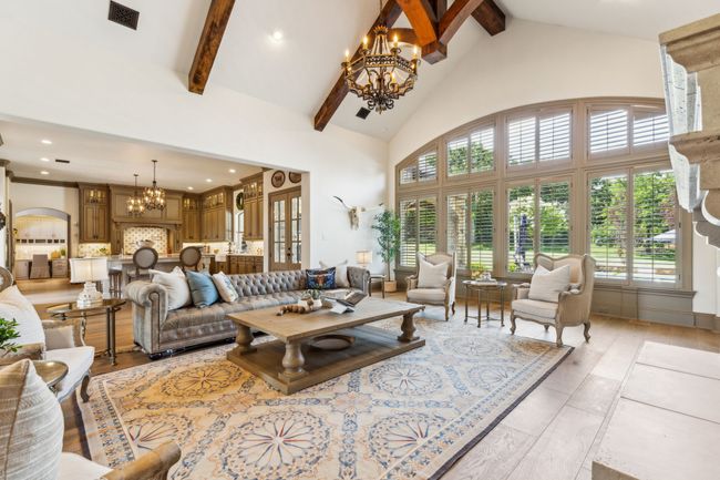 Grand Living Room with Towering Ceilings and Oversized Windows Showcasing Stunning Views | Image 8
