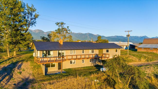 Back of property featuring a mountain view and a balcony | Image 47