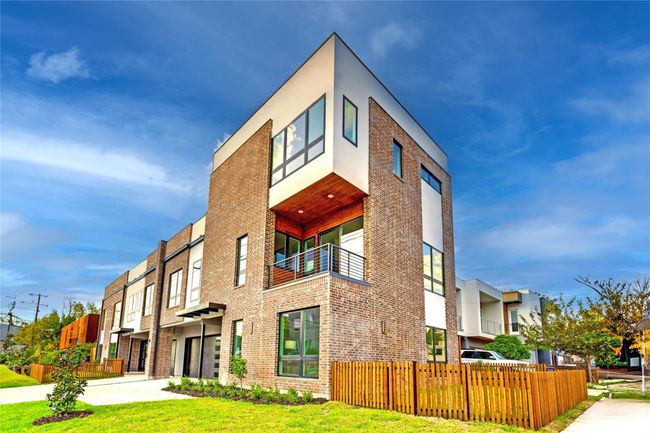 View of property with a garage | Image 4