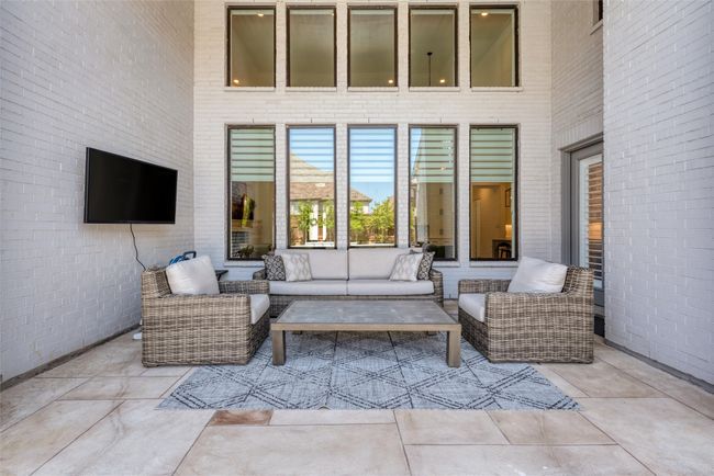 Large covered patio in the back - plenty of room to relax | Image 32