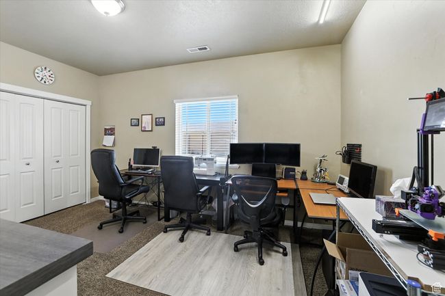 Office space with baseboards | Image 19