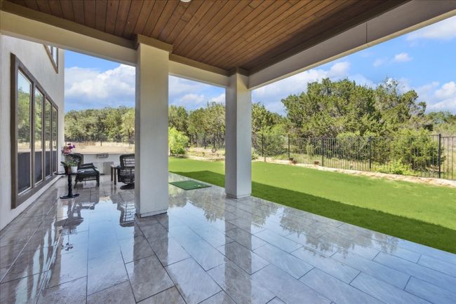 View of patio / terrace with a fenced backyard | Image 36