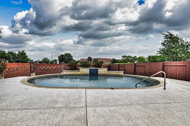 View of pool featuring a patio area | Image 6