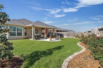 Welcome to the Bonterra at Cross Creek Ranch, which is the 55+ community, within Cross Creek Ranch. This adorable home has a beautiful oversized backyard with many flowering roses, an extended covered patio with additional pad, gas fireplace connection and faces east, so there is no afternoon sun. | Image 2