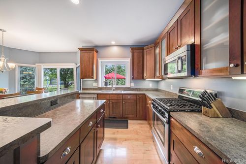 1171 Riverside St, Milford, MI, 48381-2483 | Card Image