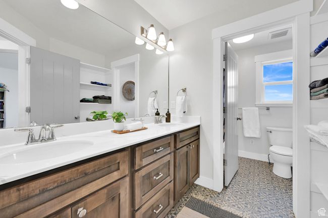 Full bathroom with double vanity and toilet | Image 43