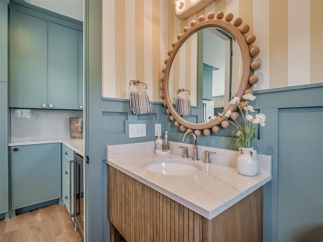 Bathroom with vanity and wood finished floors | Image 16